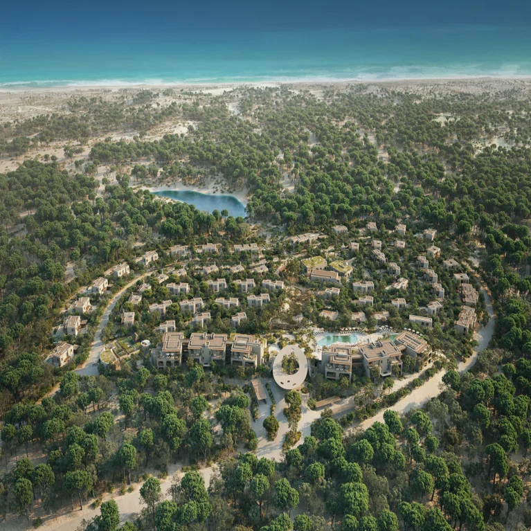 Circular resort set within lush forest, bordered by a sandy coast and blue ocean, designed to harmonize with nature and support wellness and sustainability.