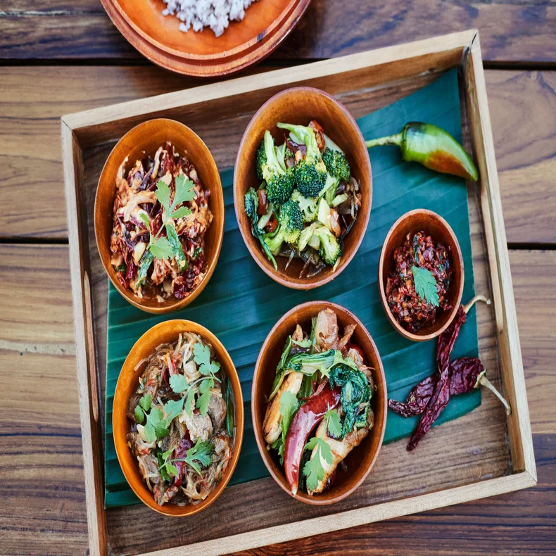 ​Light sunset refreshments on the deck followed by a traditional Bhutanese dinner.