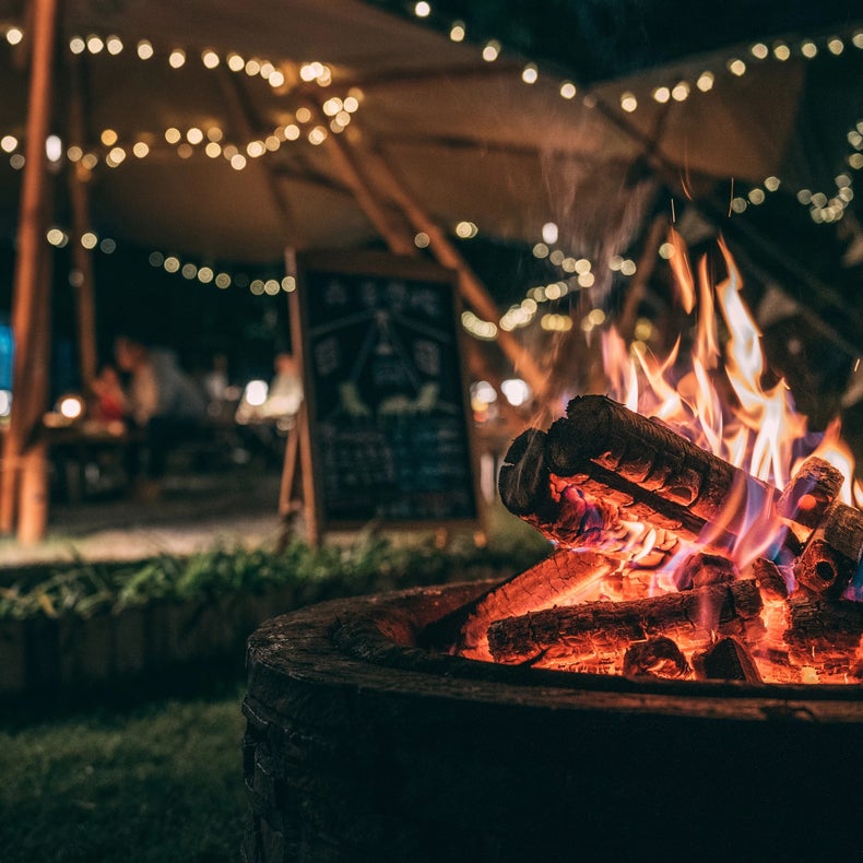 In the evening, a campfire next to your tent brings you a slight warmth, and soft string lights create an enchanting outdoor setting under the night sky....