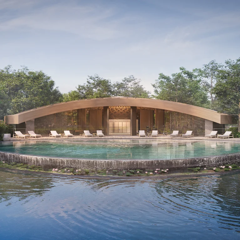 圆形建筑,屋顶呈柔和的弧形,旁边是一个圆形水池,水池边缘有瀑布,位于花园内,绿树成荫,自然宁静。.